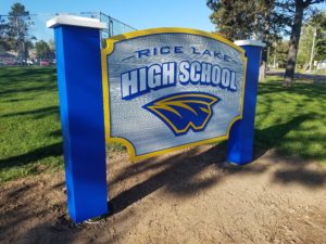sandblasted high school sign
